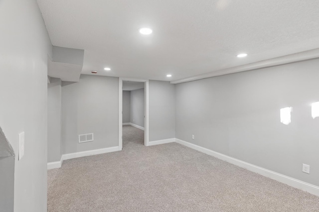 basement with light carpet