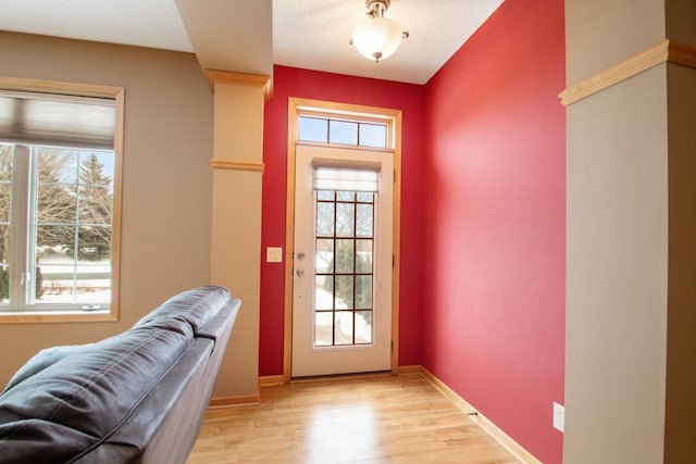 entryway with light hardwood / wood-style flooring