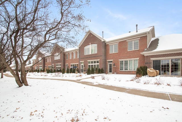 view of snow covered property