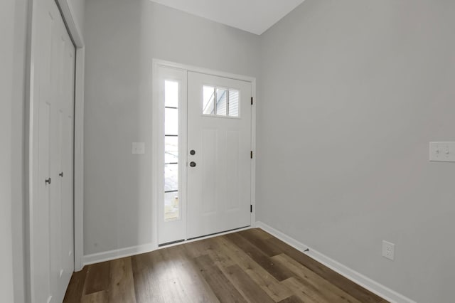 foyer entrance featuring dark hardwood / wood-style flooring