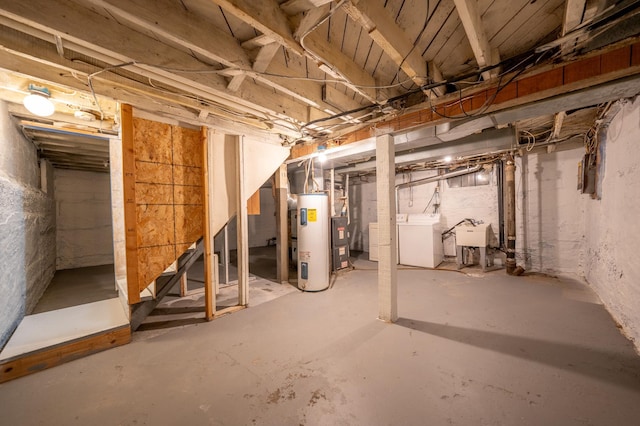 basement featuring washer / clothes dryer, sink, and water heater