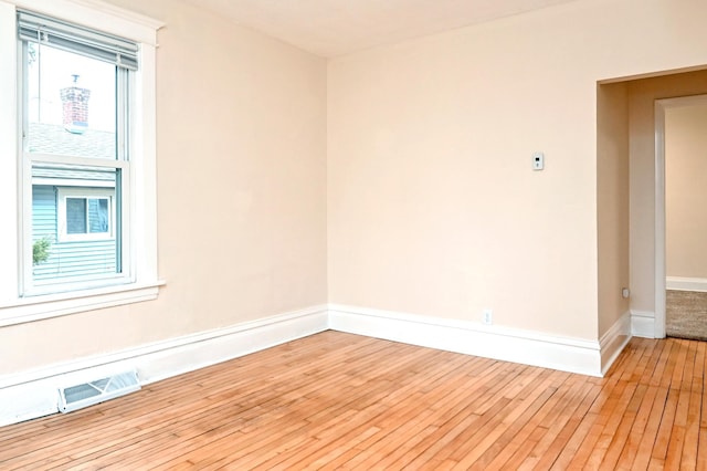 empty room with light wood-type flooring