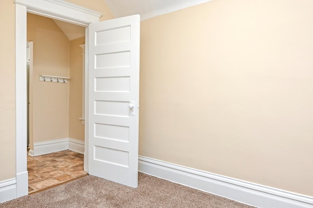 interior space with vaulted ceiling