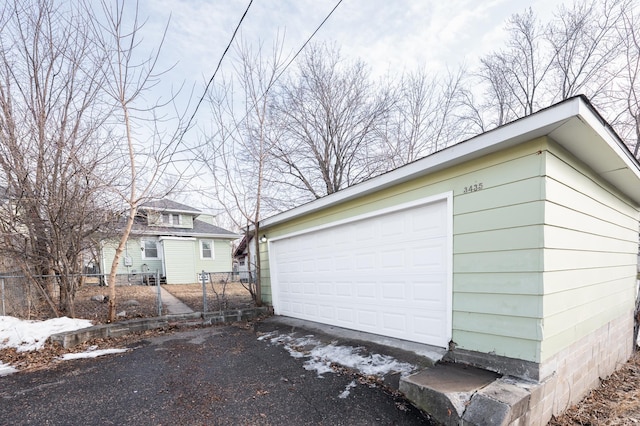 view of snow covered garage