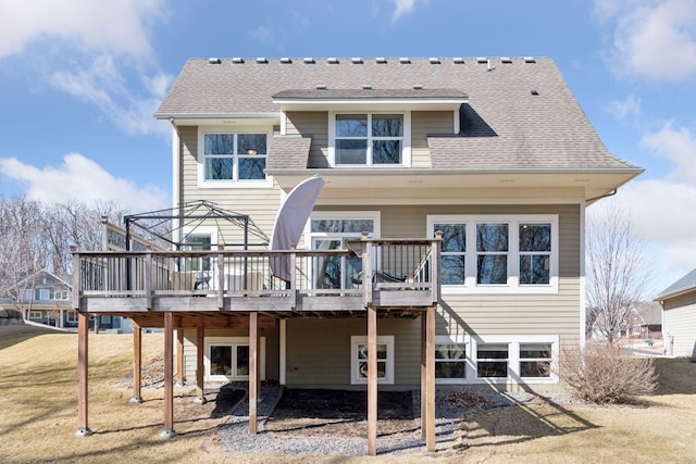 2536 Saunders Lake Dr, Minnetrista, MN 55364 - back of house featuring a deck and roof with shingles