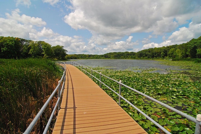 2536 Saunders Lake Dr, Minnetrista, MN 55364 - dock area with a water view and a wooded view