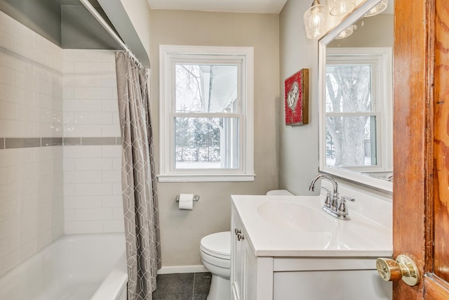 full bathroom featuring shower / tub combo with curtain, vanity, and toilet