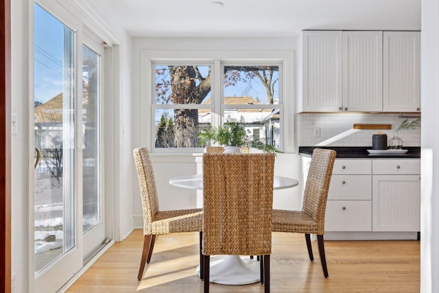 dining room with light wood-type flooring