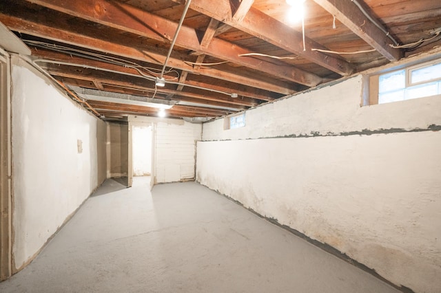 basement featuring plenty of natural light