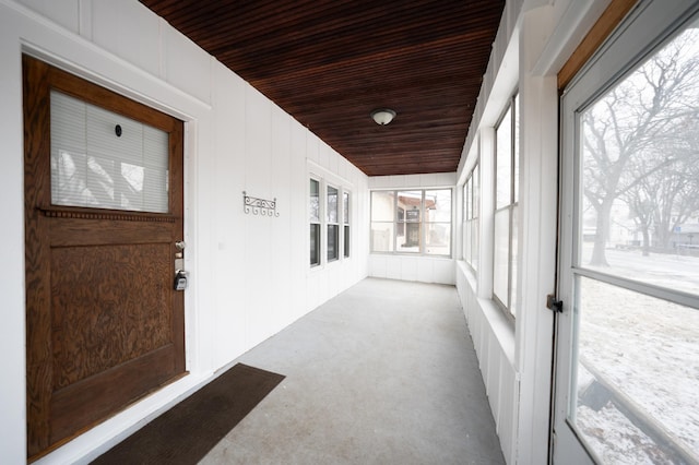 sunroom / solarium with wooden ceiling