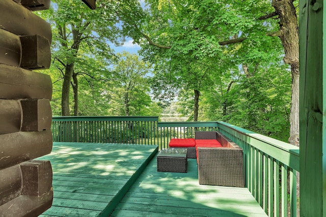 deck featuring outdoor lounge area