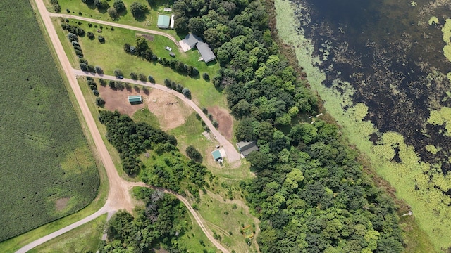 birds eye view of property with a rural view