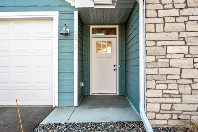 property entrance featuring a garage