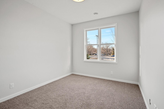 spare room with carpet flooring