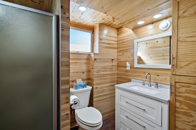 full bathroom with toilet, a stall shower, vanity, and wood walls