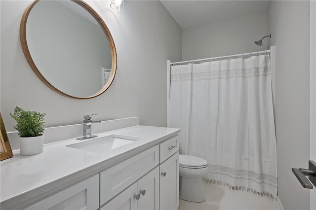 bathroom with tile patterned floors, vanity, toilet, and a shower with shower curtain