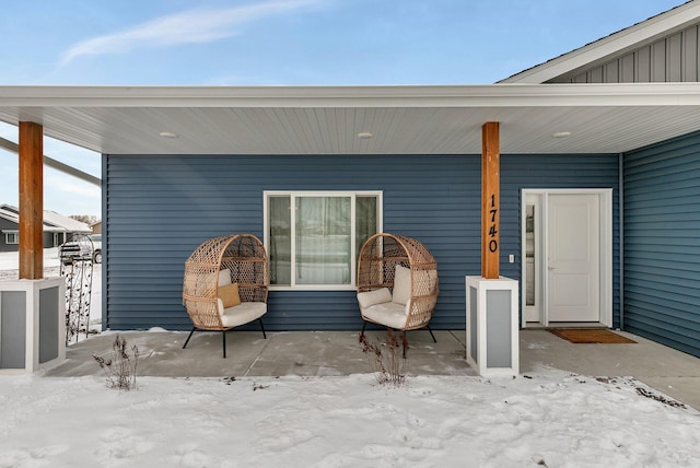 view of snow covered patio