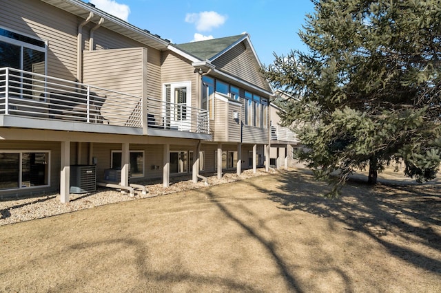 view of side of property with cooling unit