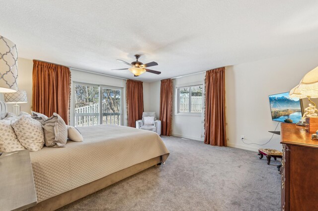 7720 Shaughnessy Rd, Edina, MN 55439 - carpeted bedroom with multiple windows, access to outside, and ceiling fan