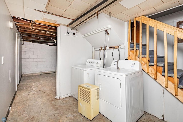 washroom featuring independent washer and dryer