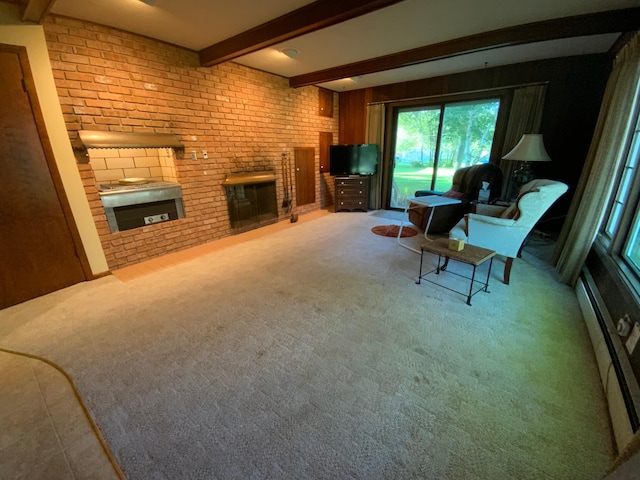 carpeted living room featuring beam ceiling, brick wall, a fireplace, and baseboard heating