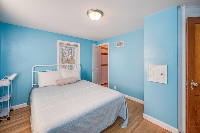 bedroom featuring light wood-type flooring