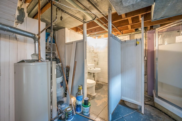 utility room featuring gas water heater