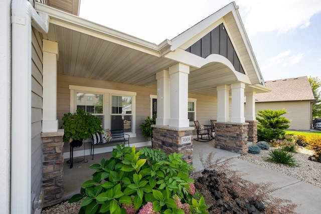 doorway to property featuring covered porch