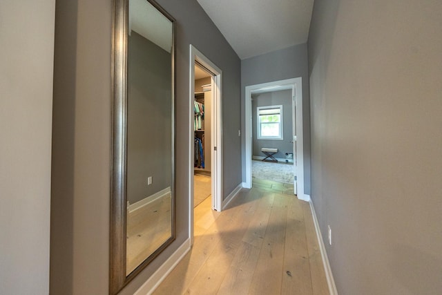 corridor featuring light wood-type flooring