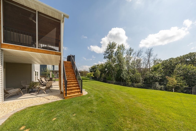 view of yard with a patio and a sunroom