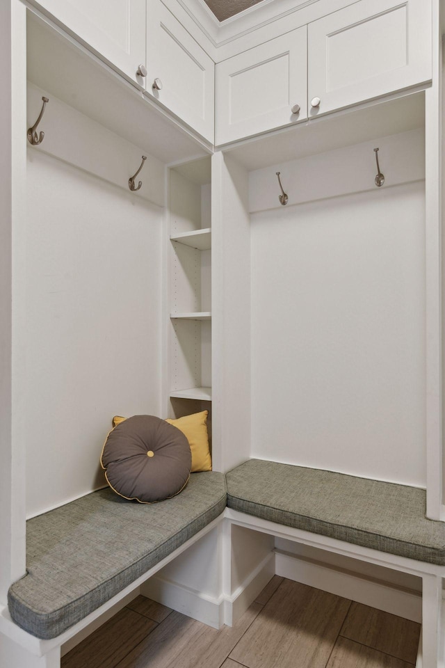 mudroom with wood finished floors