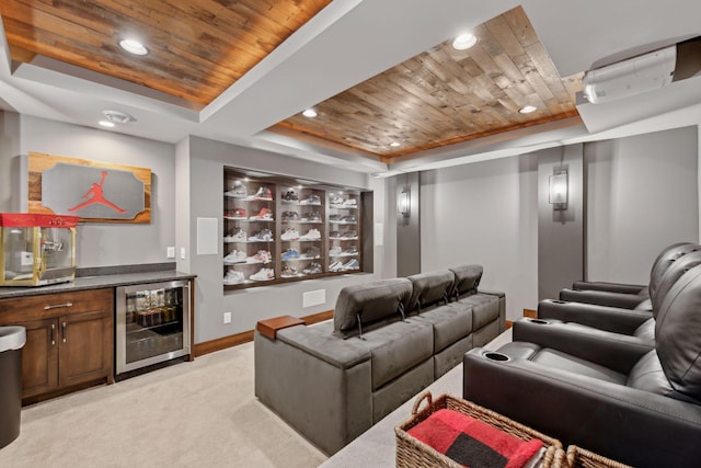 cinema featuring wine cooler, wood ceiling, indoor bar, and a tray ceiling