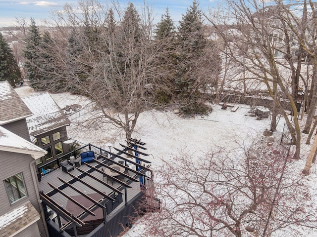 view of yard layered in snow