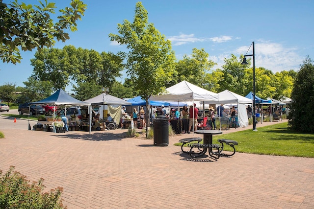 surrounding community with a yard