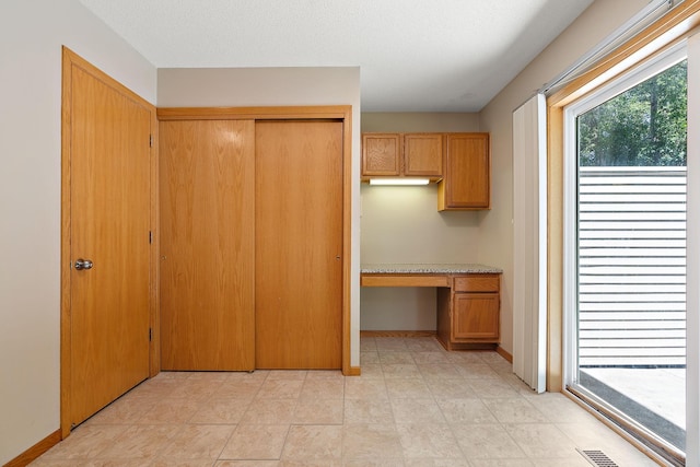 kitchen featuring built in desk