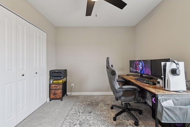 office area with light carpet and ceiling fan