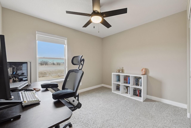 office area with light carpet and ceiling fan