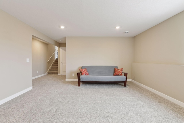 sitting room with carpet flooring