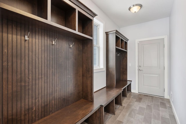 mudroom featuring baseboards