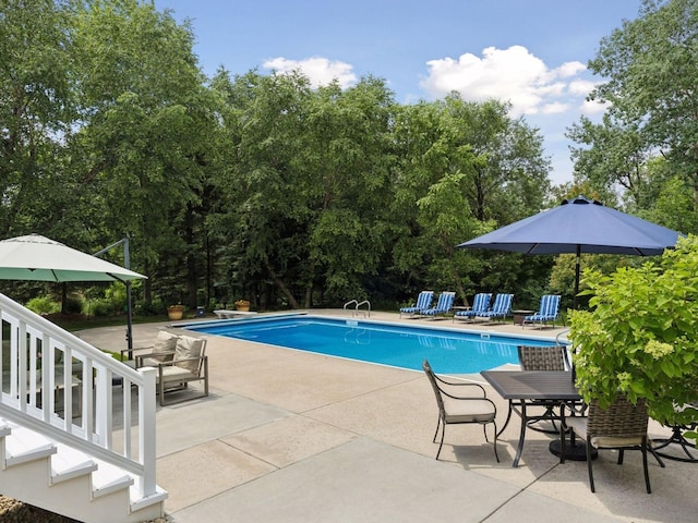 pool with a patio