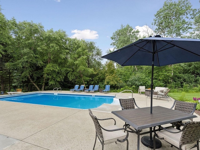 pool featuring a patio area