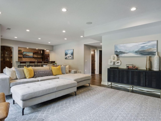 living area featuring recessed lighting and wood finished floors