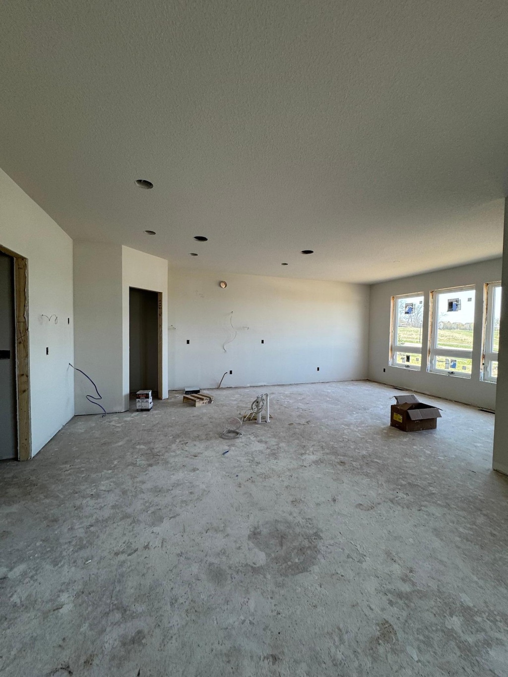 spare room with a textured ceiling
