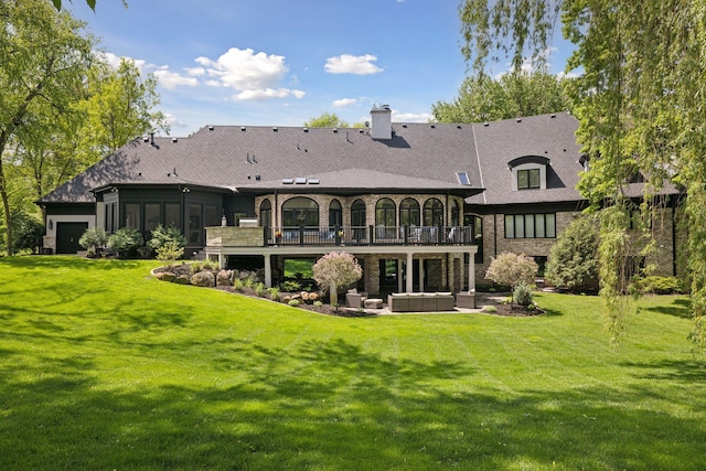 rear view of property featuring an outdoor living space and a yard