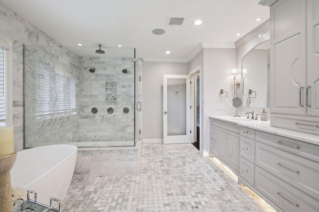 bathroom with vanity, ornamental molding, and independent shower and bath