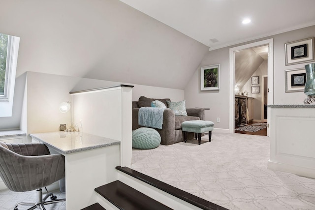 bedroom featuring lofted ceiling and light colored carpet