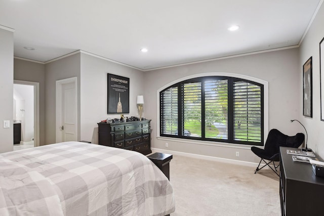 bedroom featuring ornamental molding and light carpet