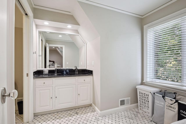 bathroom with vanity and crown molding