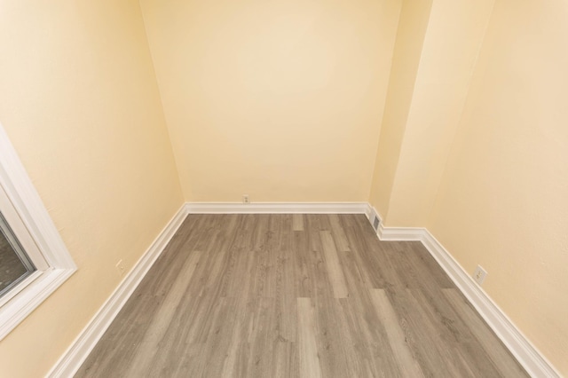 unfurnished room featuring light hardwood / wood-style flooring