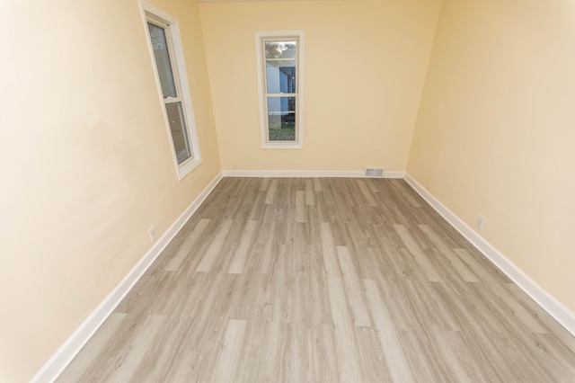 empty room featuring light hardwood / wood-style floors